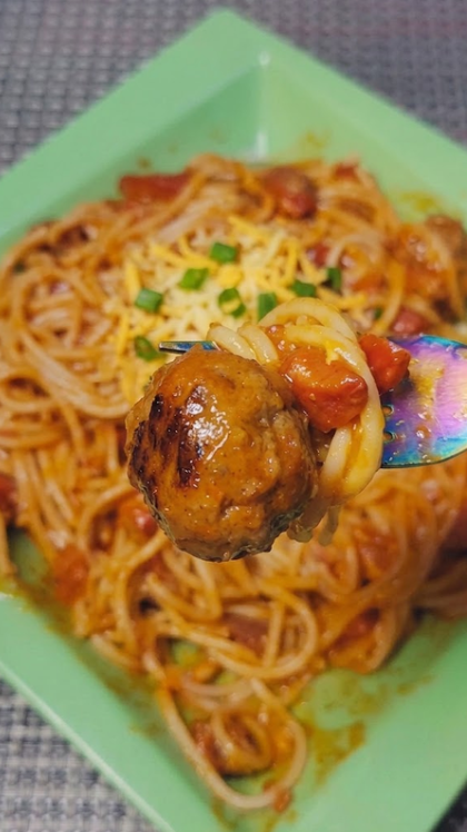 Filipino spaghetti with meatballs and a rich tomato sauce