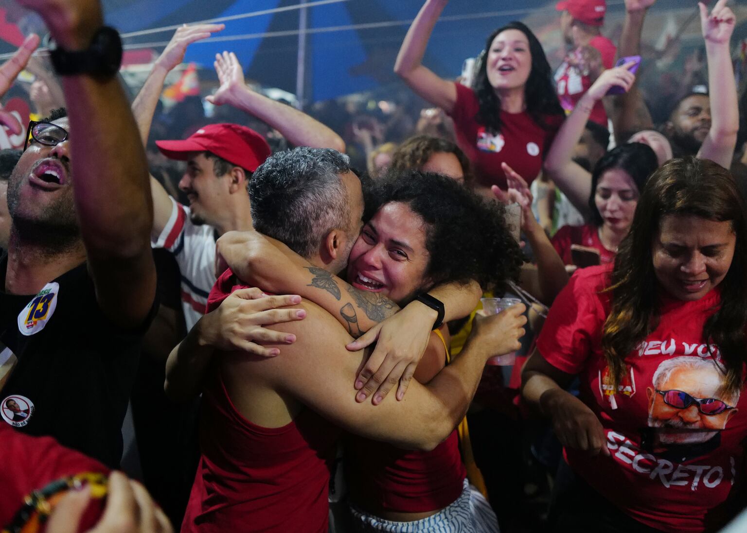 Supporters of President Luiz Inacio Lula da Silva celebrating in Rio de Janeiro after he was announced the winner of the presidential run-off (AP Photo/Lucas Landau)