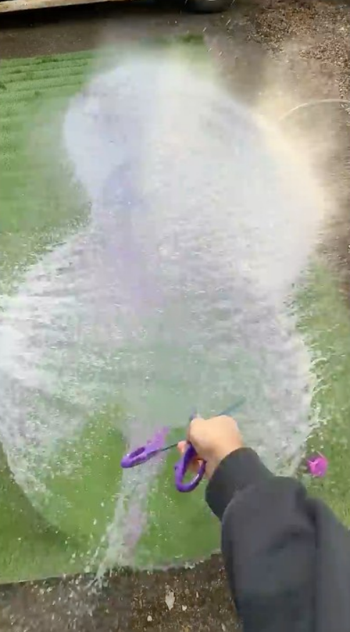 Inflating a purple pickle until it bursts