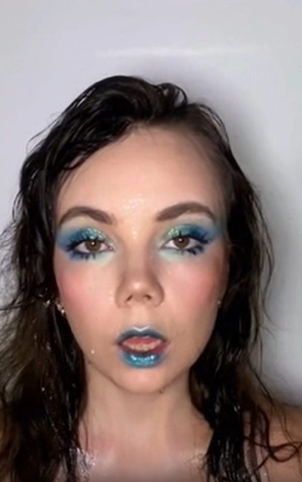 From makeup to mermaid with a water transition