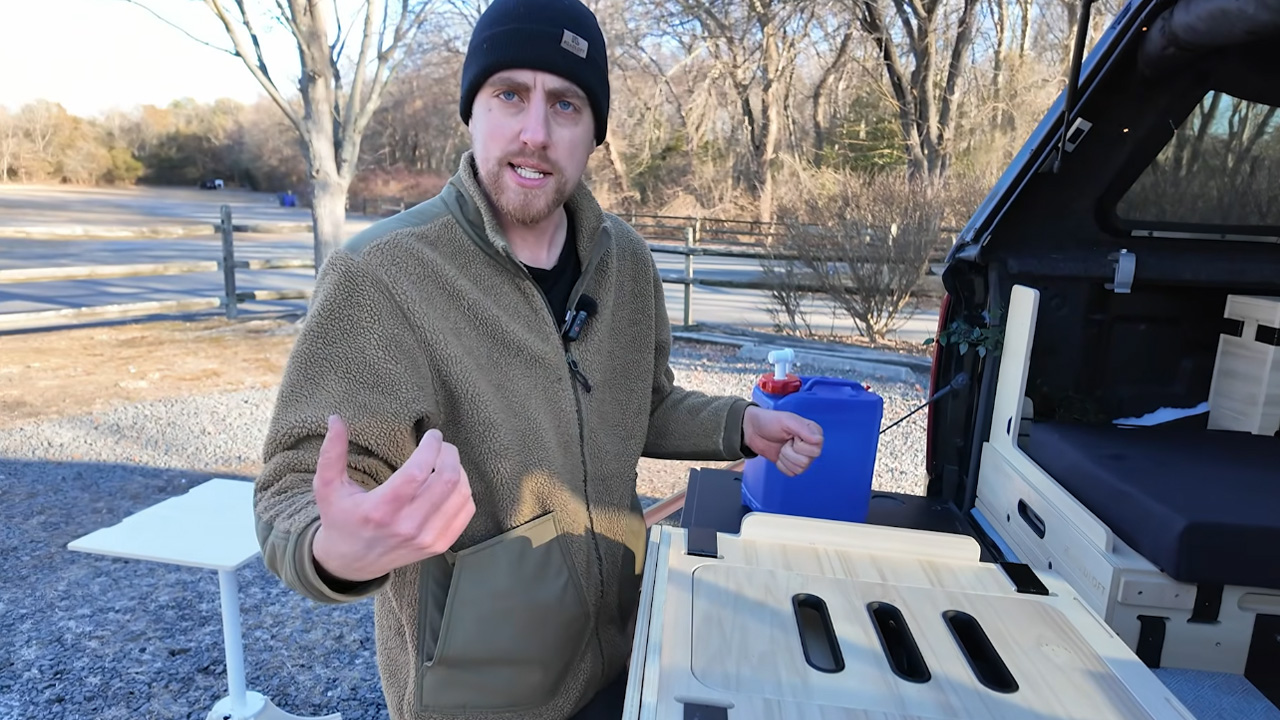 Brilliant pickup camper setup features slide out kitchen and bed