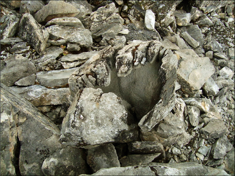 A mysterious 40-meter cone of about a million tons of limestone rises ...