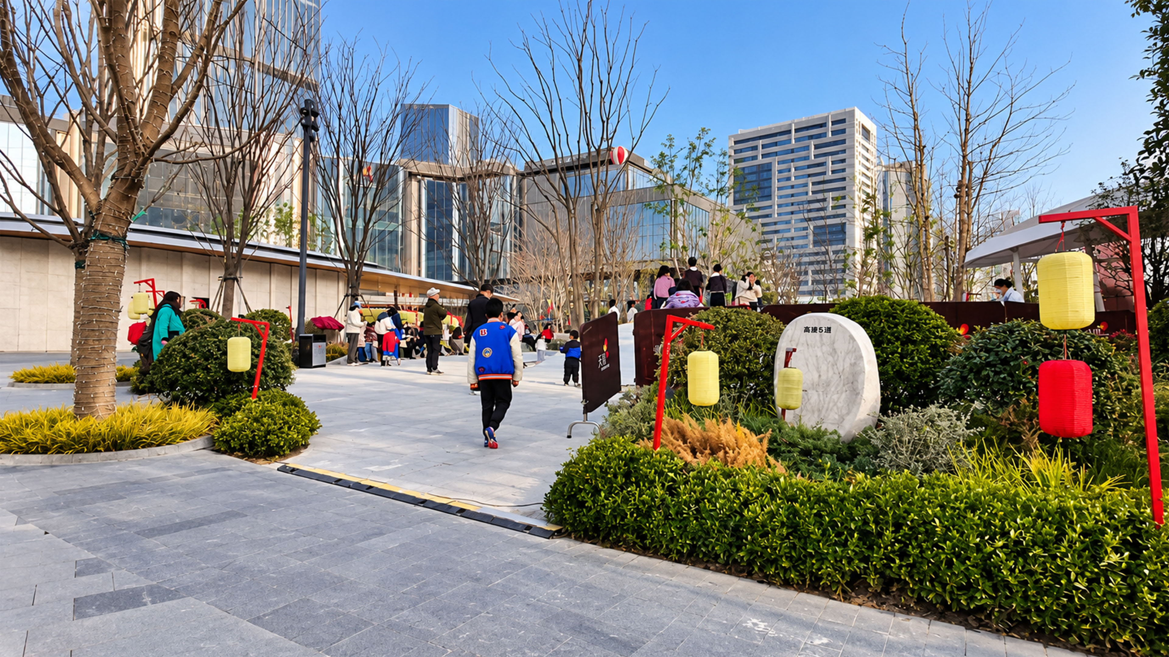 Traditional Chinese lanterns line a modern walkway in Chongqing