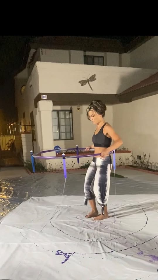 She turns hula hooping into a display of spinning artistry