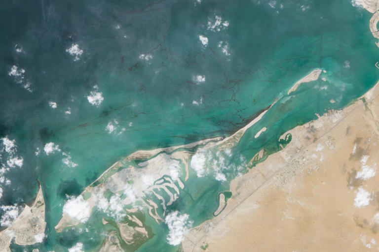 Satellite images show huge oil spill spreading as UAE closes beaches