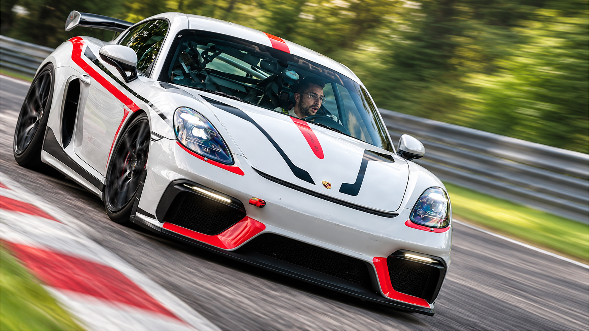 Porsche Cayman GT4 RS attacks Nürburgring kerbs