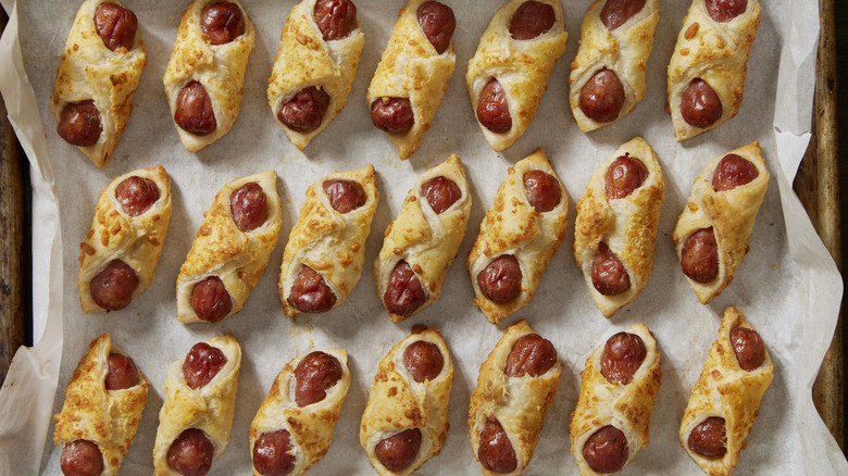 Wrap hot dogs in this breakfast staple for a sweet spin on pigs in a ...