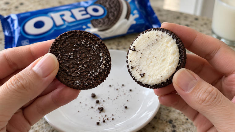 Why Oreo filling usually stays on one side when twisted apart