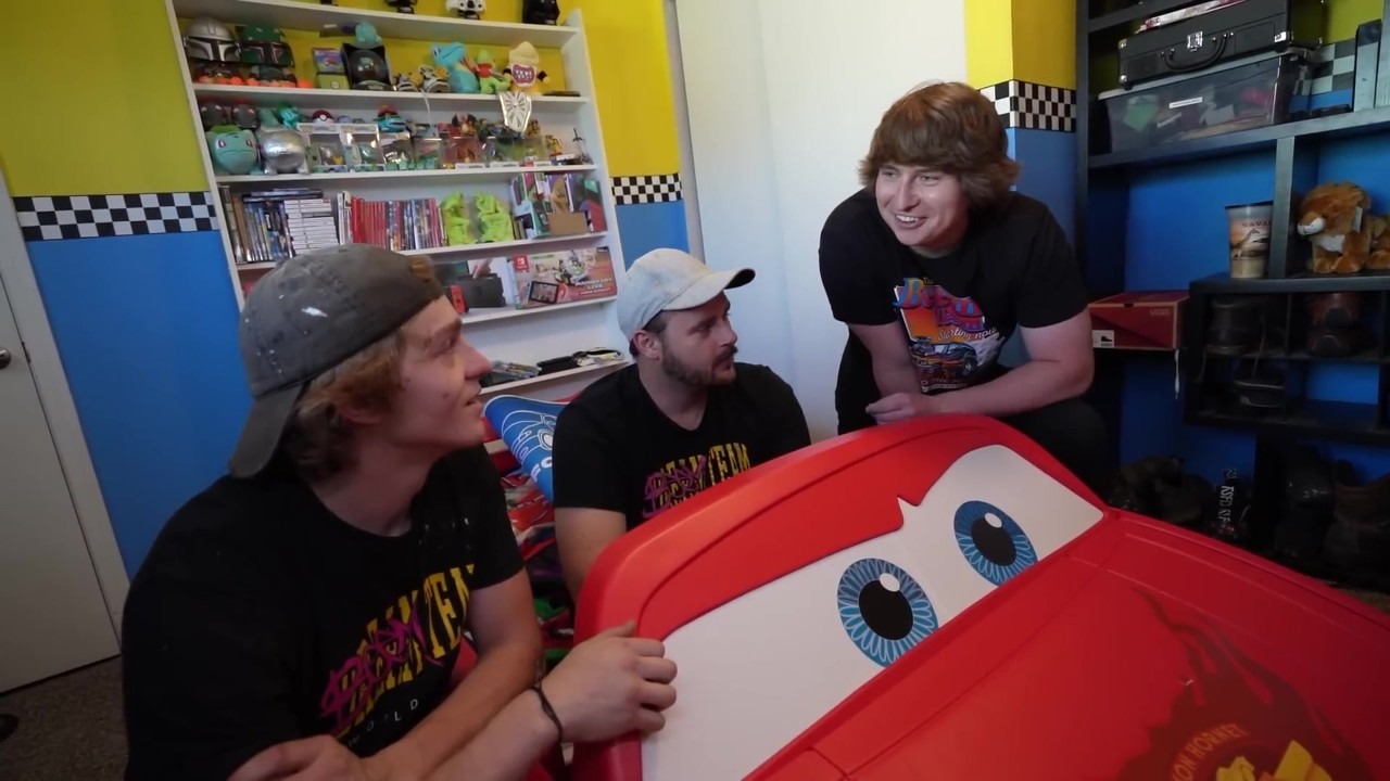 Matthew Beem builds a foam shell for a Lightning McQueen car