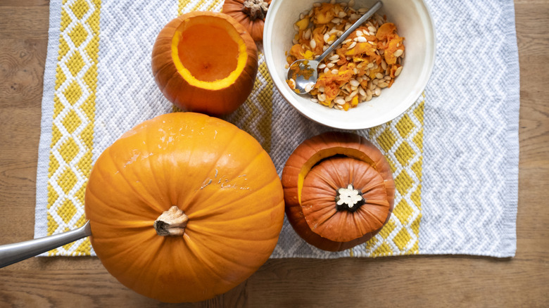 Use your hand mixer to remove the guts of a pumpkin with ease