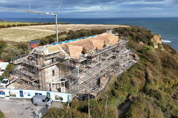 Major milestone reached for groundbreaking hotel under construction ...