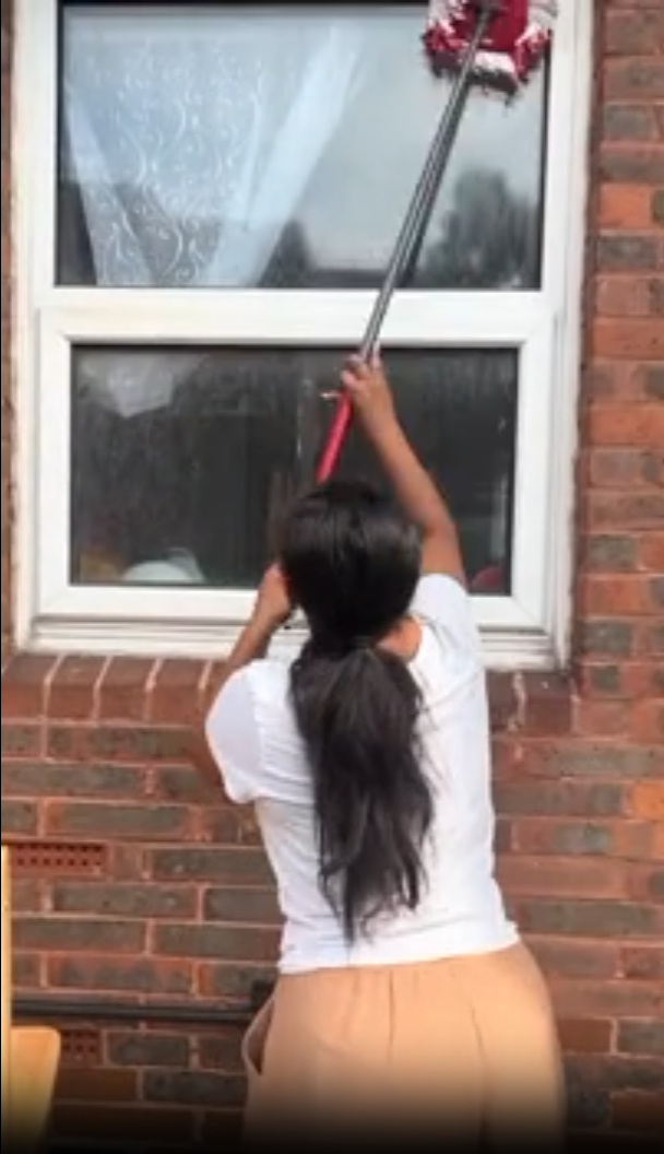 Cleaning windows with my 10 year old child