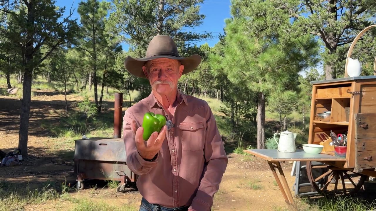 A cowboy cook made jambalaya in a wok built from an old plough disc