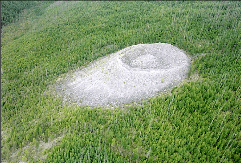 A mysterious 40-meter cone of about a million tons of limestone rises ...