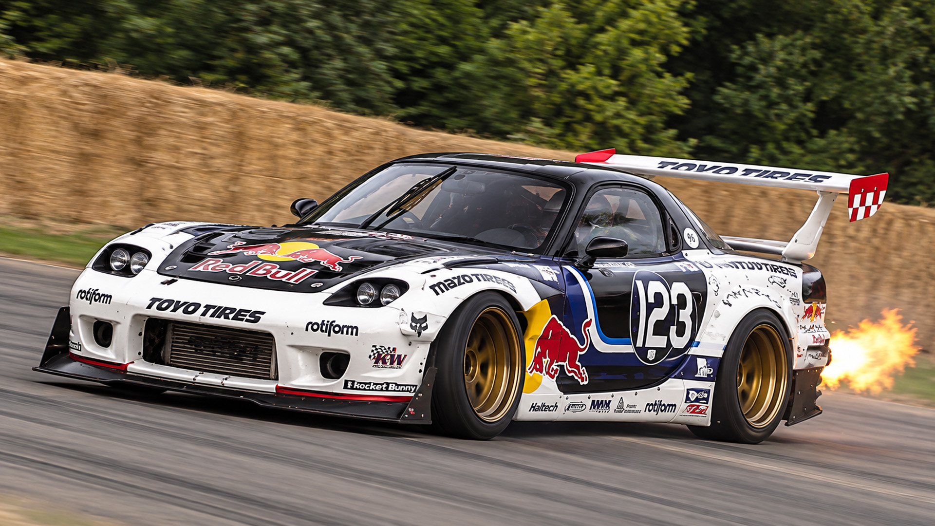 Mazda RX-7 26B quad-rotor spitting flames during a drift run