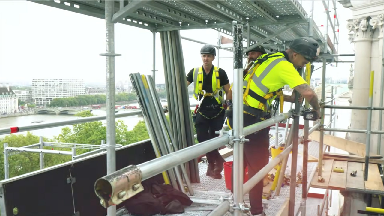 Scaffolders push through massive delays to reach roof height at ...