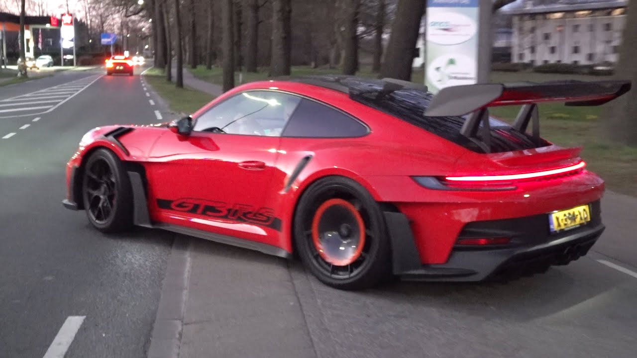 The Porsche 911 GT3 RS charges past in one full-throttle run