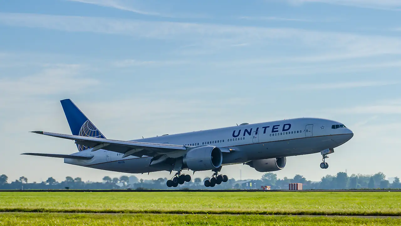 United Airlines flight forced to return midair after crew member ...