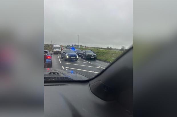 Armed police stop car and arrest two over suspected weapons offence