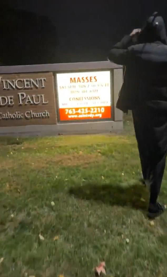 Man in robes filmed smashing sign outside Minneapolis Catholic church