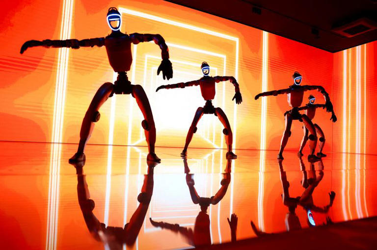 FILE PHOTO: Unitree G1 Humanoid Robots dance during an uveiling event to announce new services by GMO AI & Robotics Corporation (GMO AIR) in Tokyo, Japan, September 8, 2026. REUTERS/Issei Kato/ File Photo