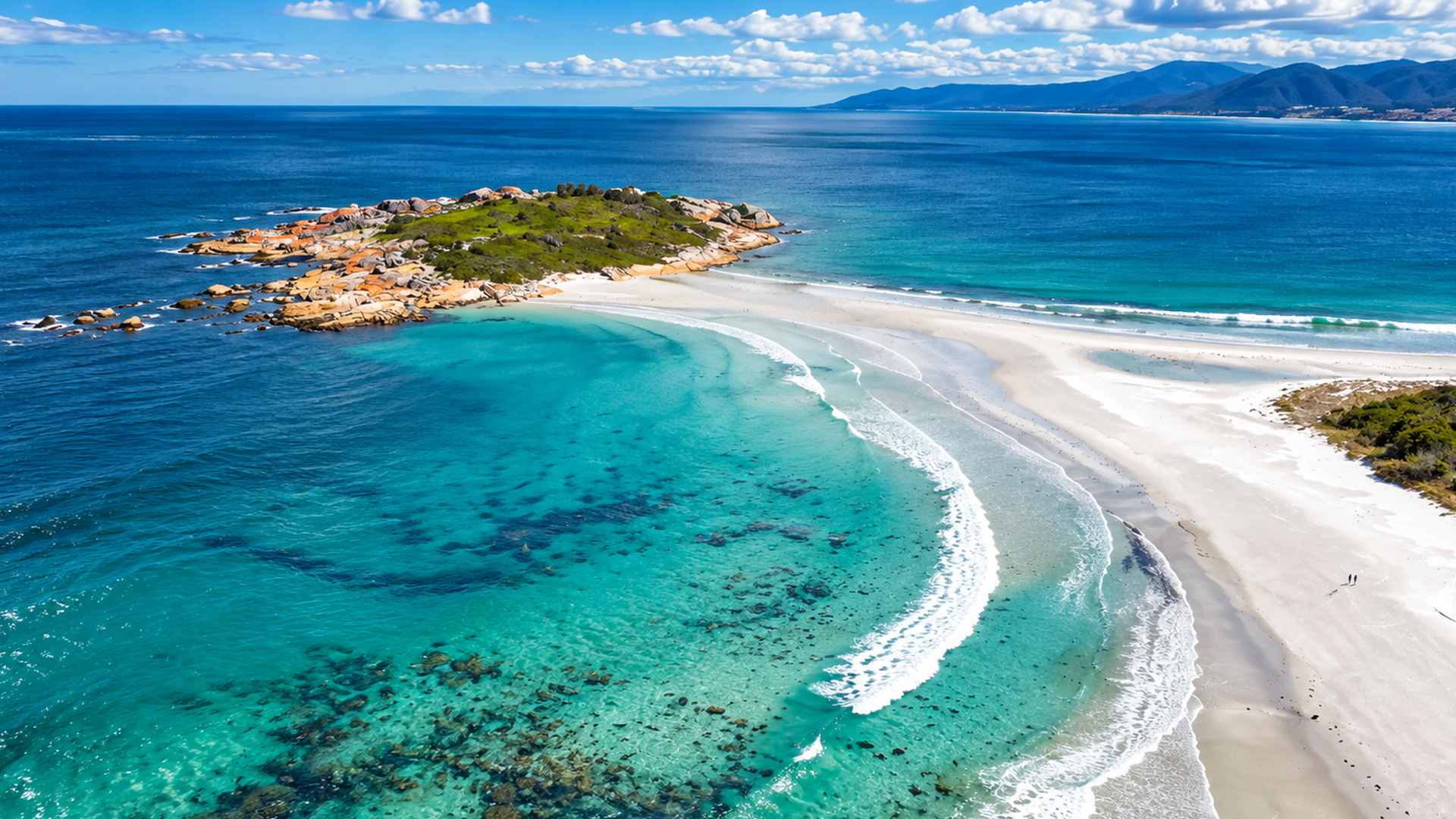 An island connected to Tasmania by a sandy beach