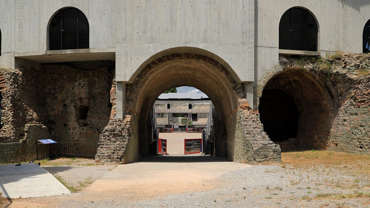 A Roman house with a coloured concrete floor and a marble basin emerged ...