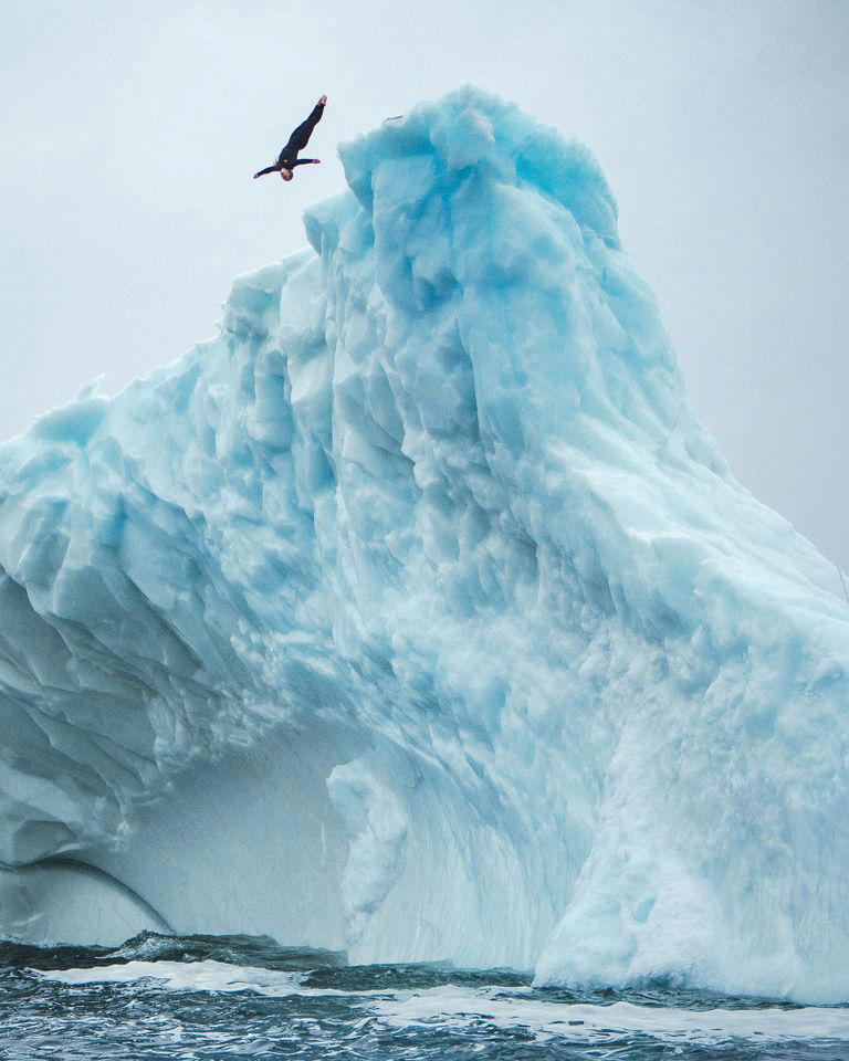 Cliff diver Molly Carlson makes history as first woman to dive off iceberg