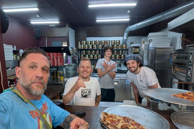 Hollywood heart-throb Tom Hardy spotted at city pizza restaurant