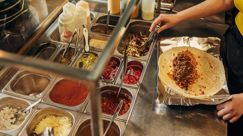 This Colorado build-your-own burrito chain serves traditional green ...