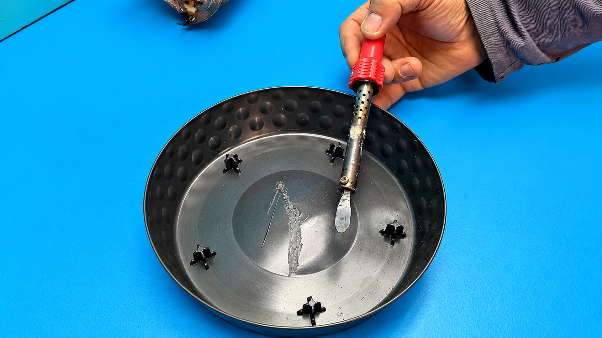 Watch a simple soldering iron technique weld cracked plastic without glue