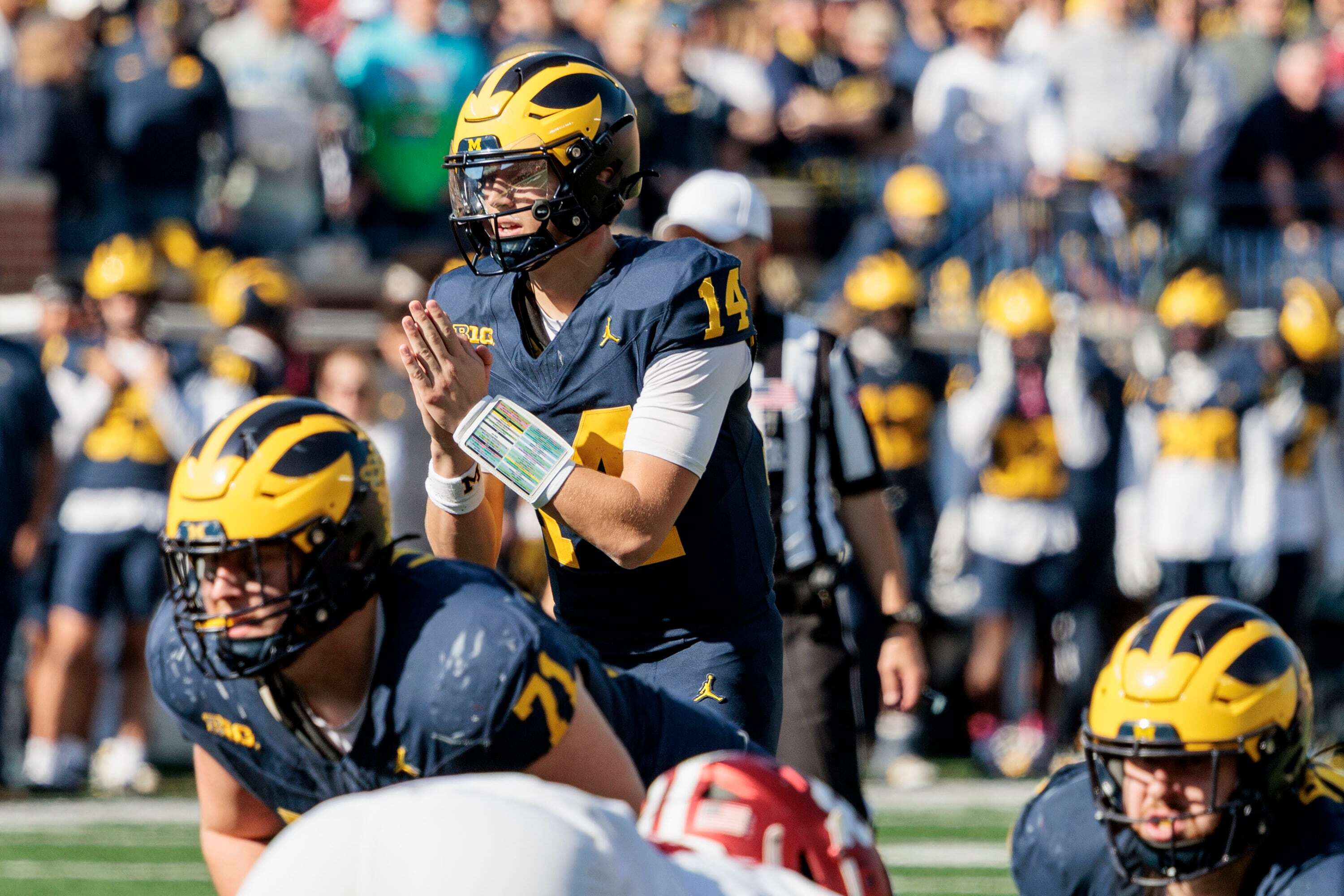 Michigan’s Whittingham won’t say who will start at QB vs. Rutgers