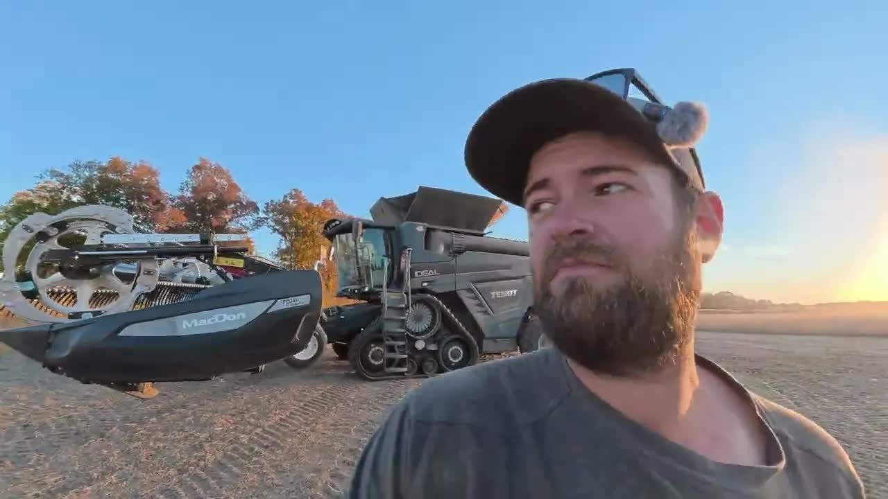 A combine header hit the grain cart’s folded auger — misalignment left ...