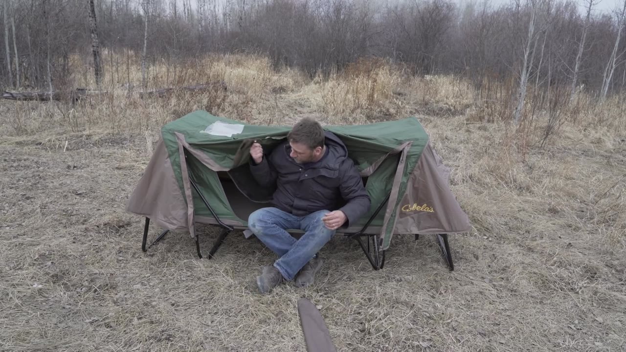 Steve Wallis tests a 40-pound tent cot in snowfall and stays dry