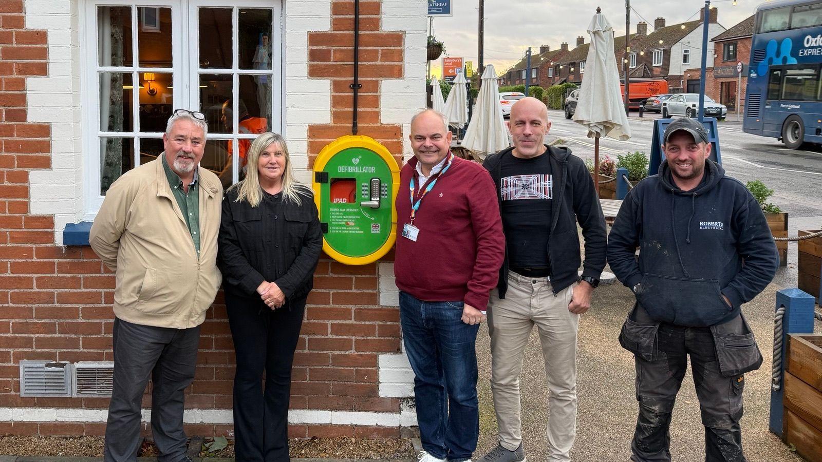 Defibrillator installed at pub with personal link