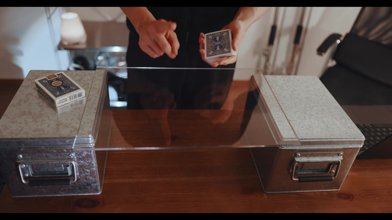 Oscar Owen's card-through-glass setup