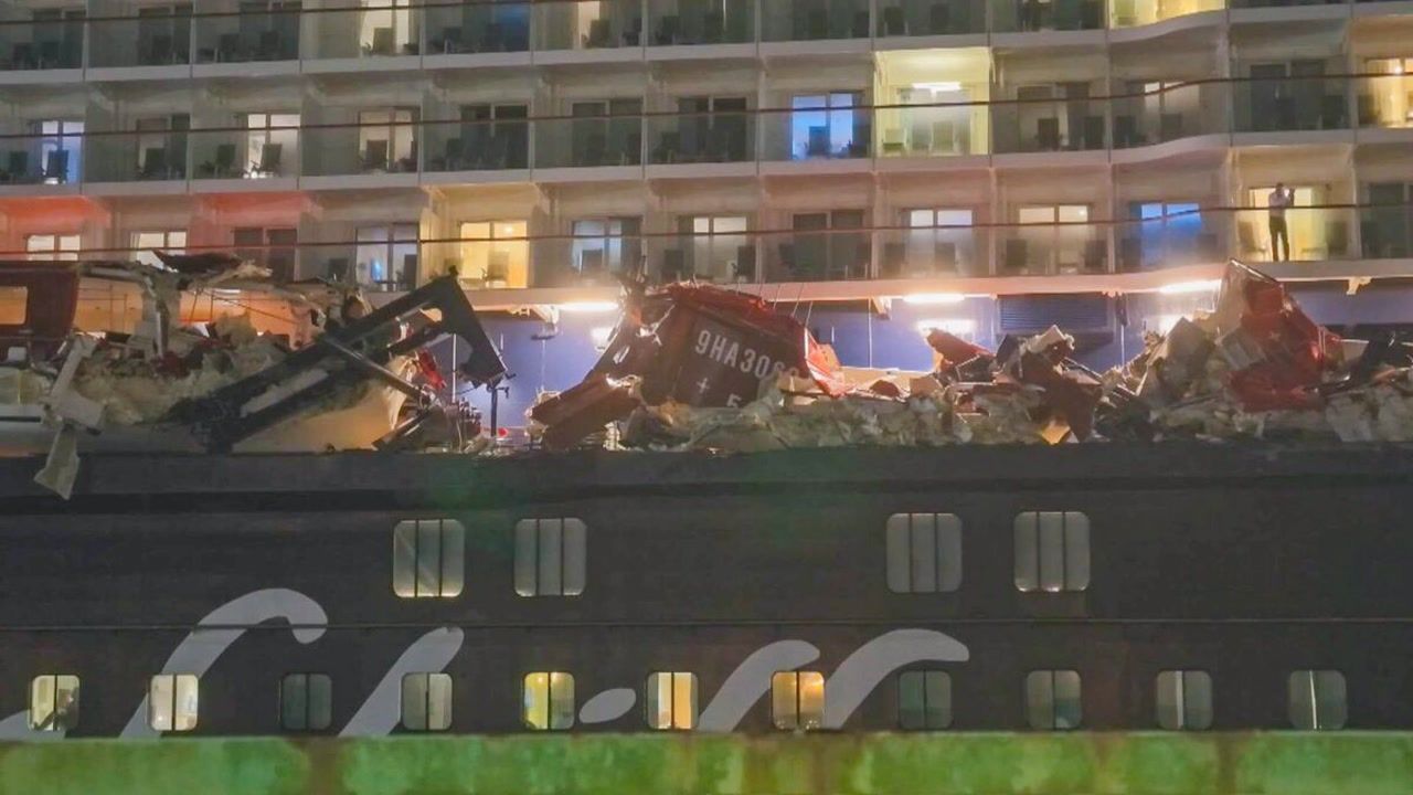 Cruise liner carrying over 2,428 passengers crashes into container ship ...