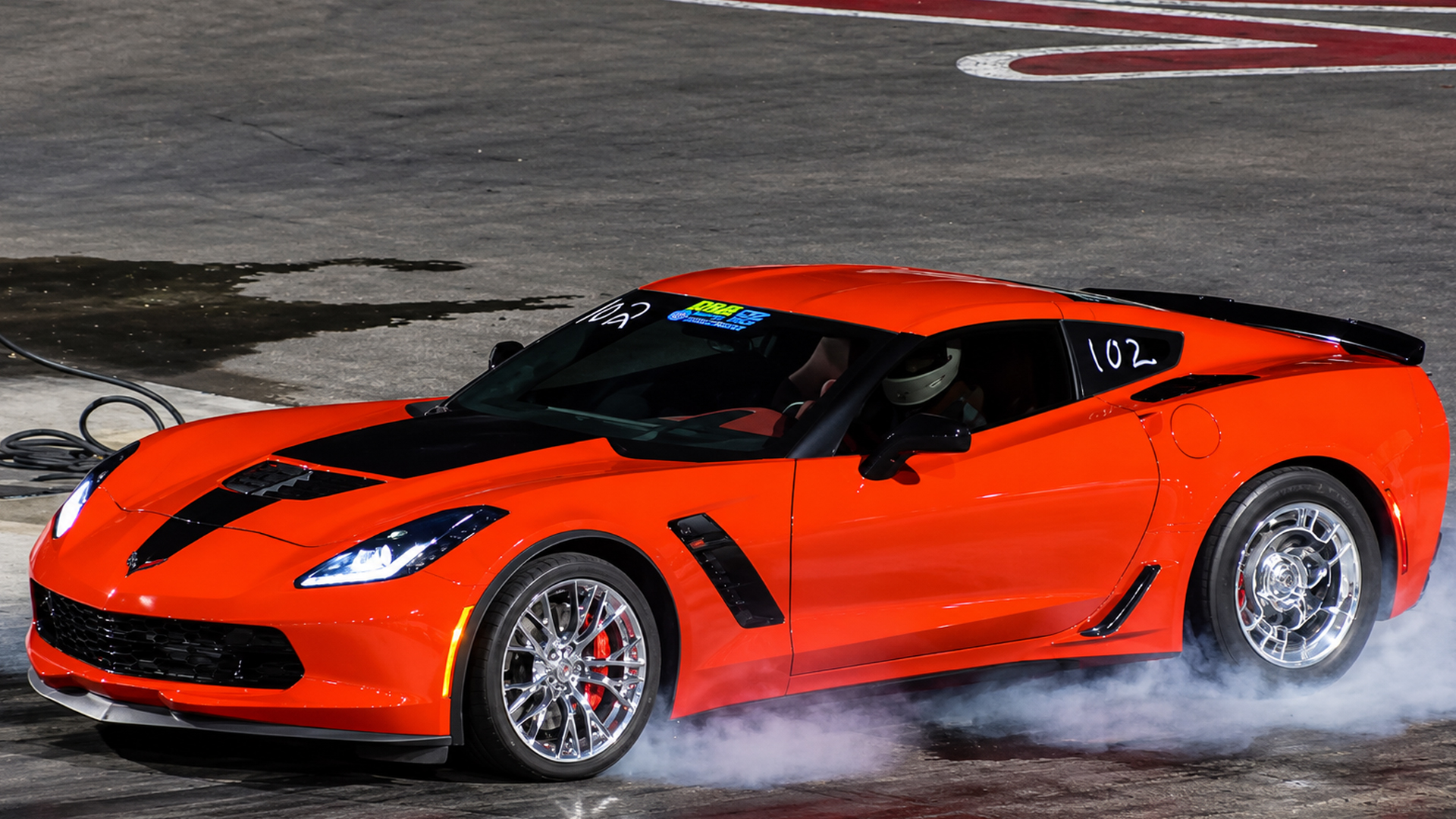 Watch a 650-hp C7 Corvette Z06 drag race a supercharged Dodge Hellcat