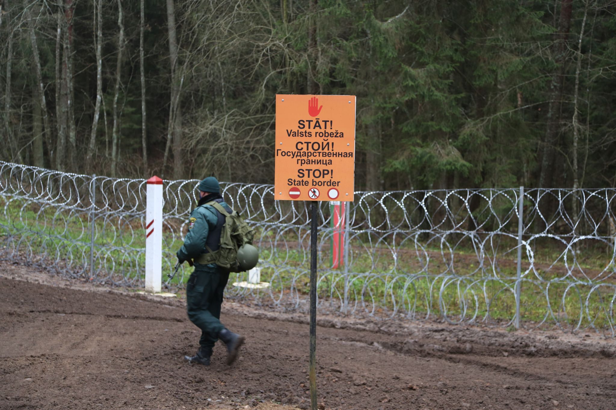 Latvia says Belarus pushing migrants to break border infrastructure