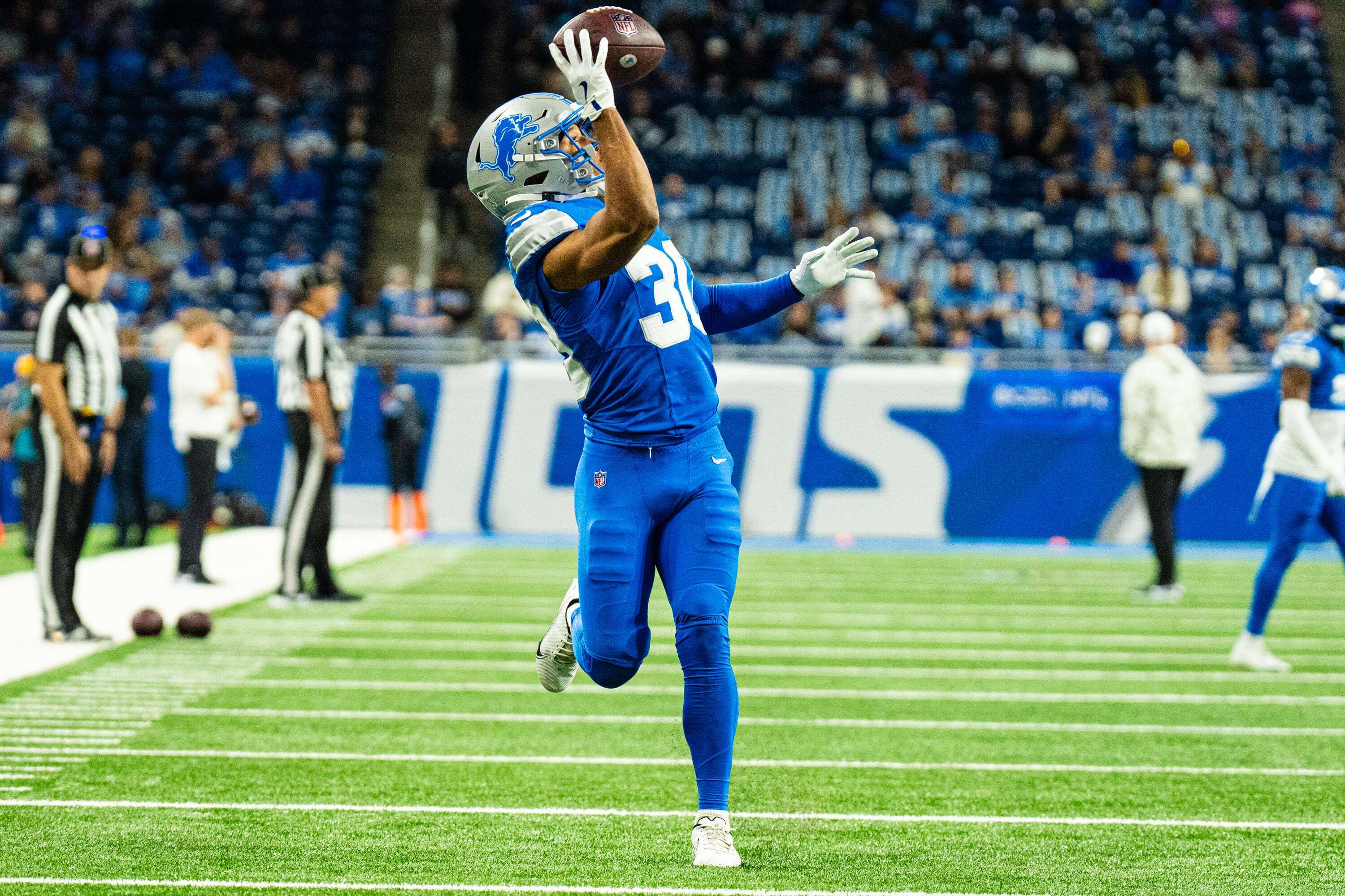 Muskegon United Way raffle winner gets Lions tickets, autographed football