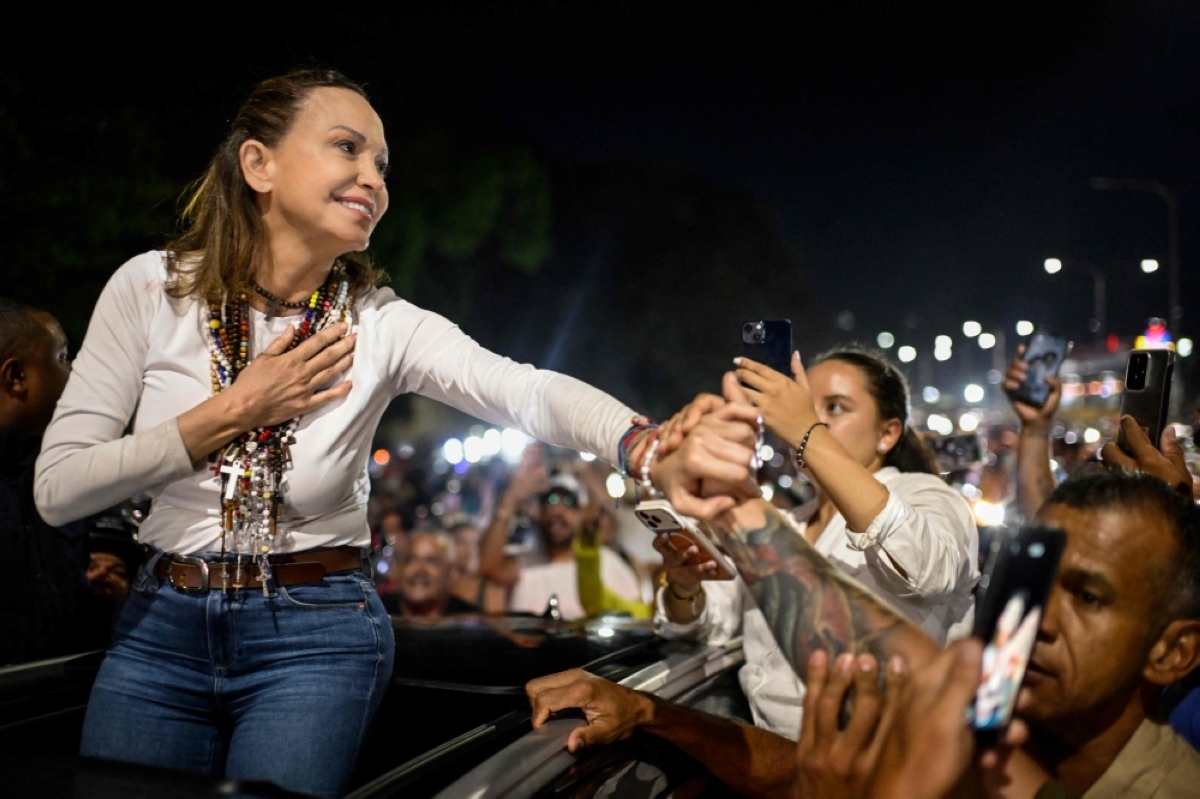 Venezuela’s Machado returns home after exile