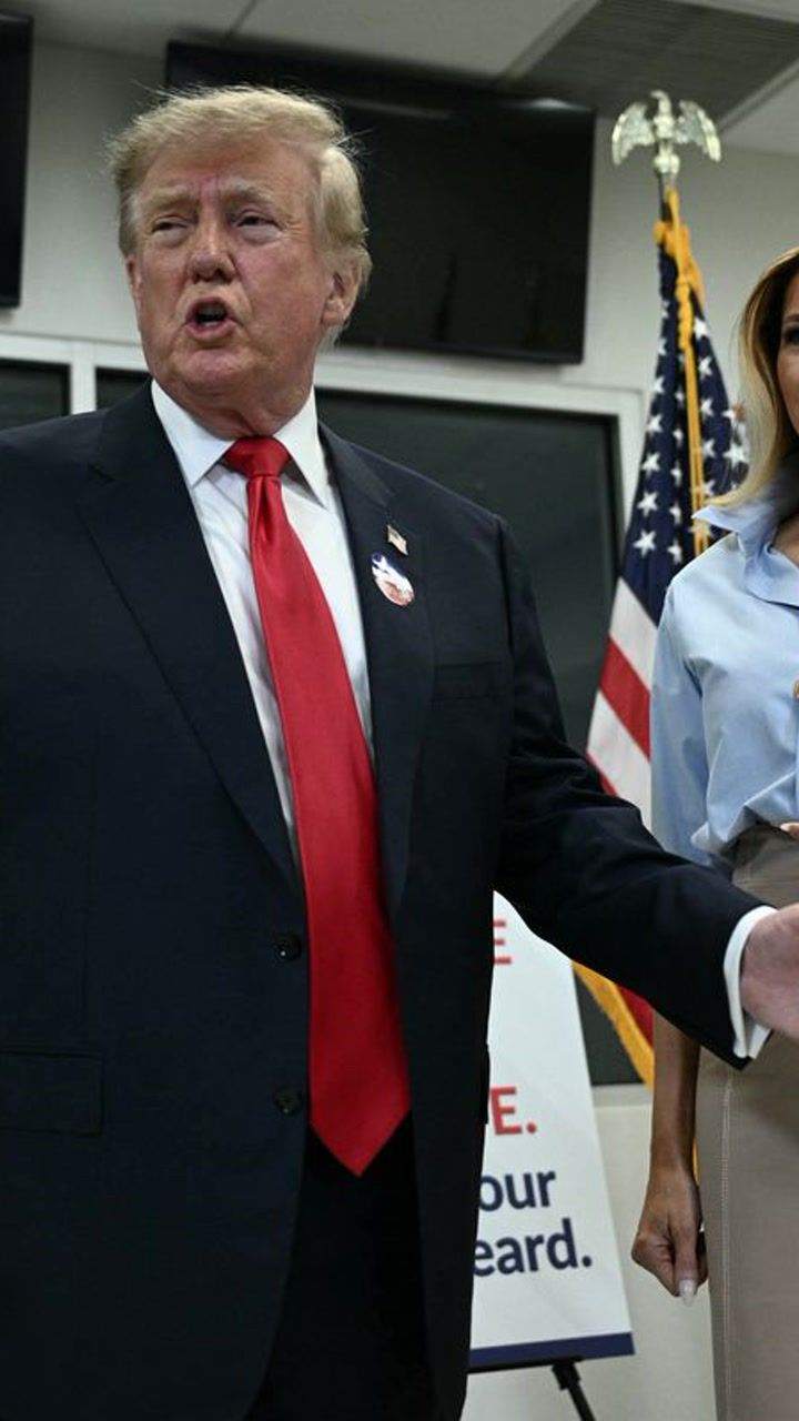 Melania Trump watches on as Donald ogles senator's body