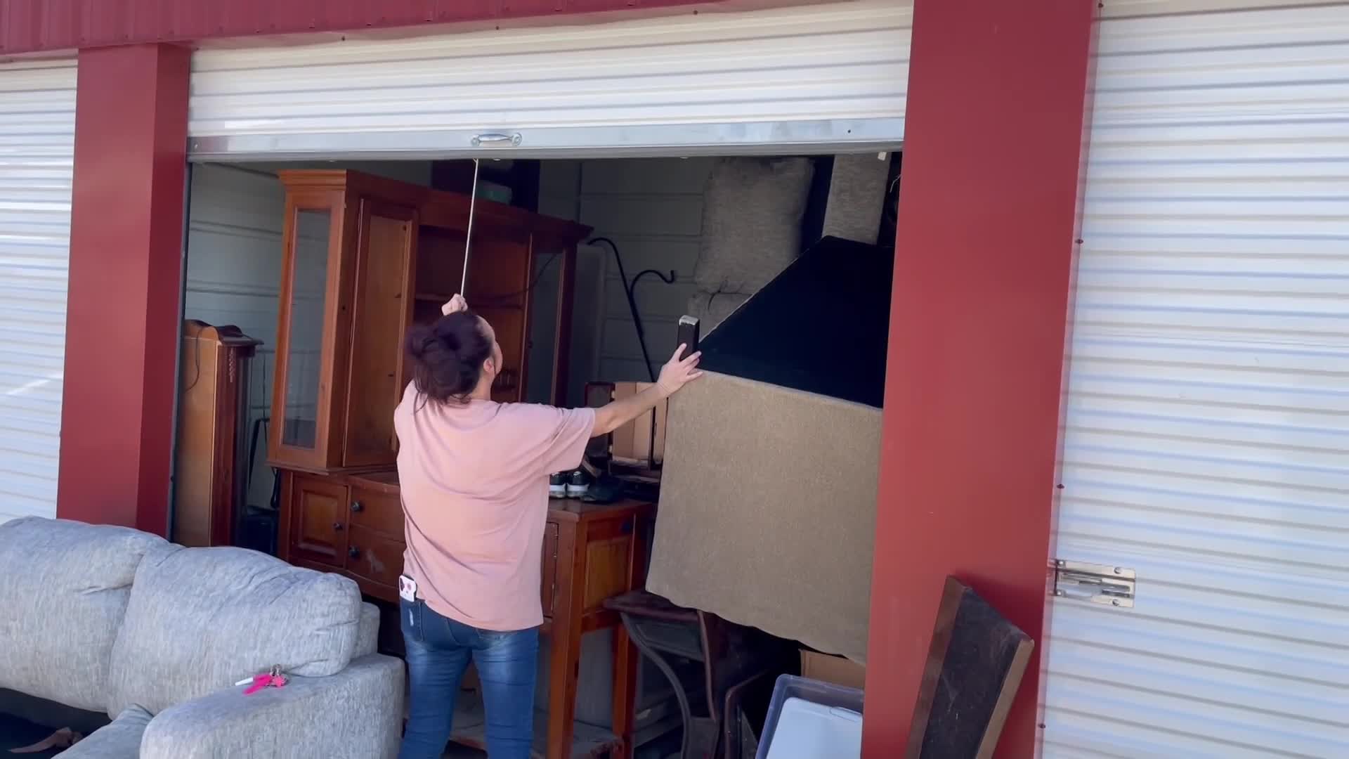 Woman's belongings ruined after storage unit leak. Who pays?