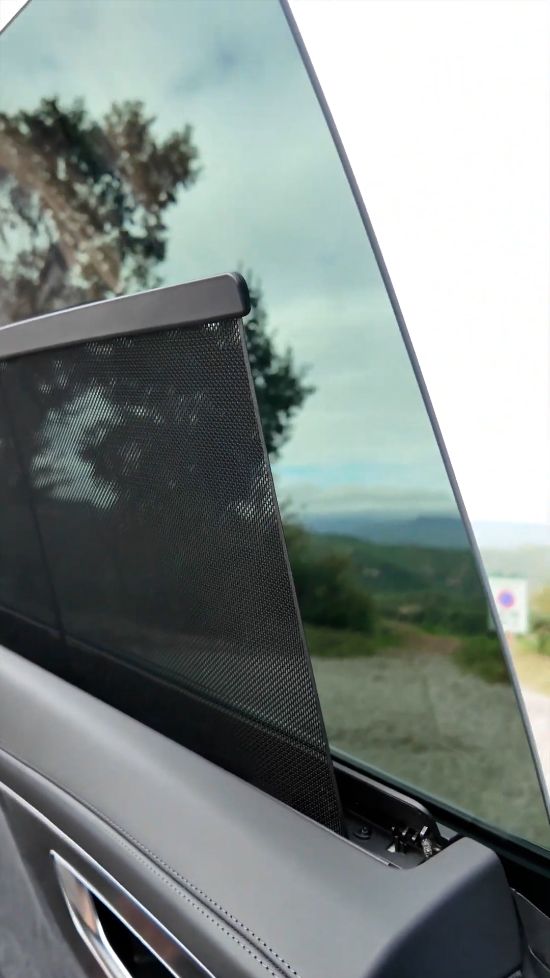 The electric rear window sunshade mechanism in the Audi RSQ8