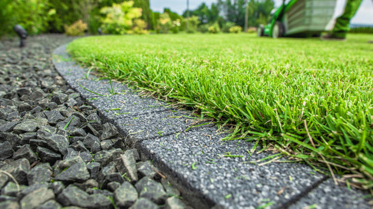 Keep grass out of gravel driveways with a durable edging that looks good