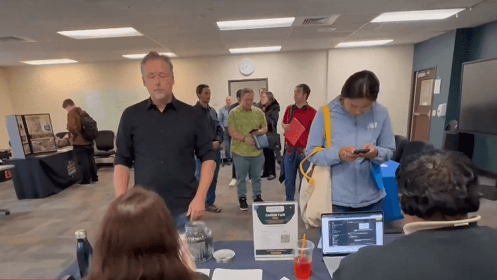 Dozens line up for Lane County job fair as AI screening reshapes hiring