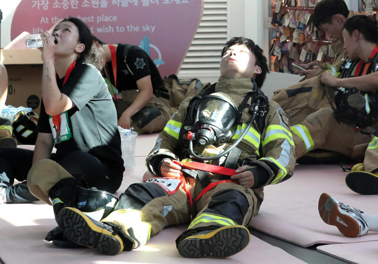 Firefighters climb 100th floor in high-rise readiness competition