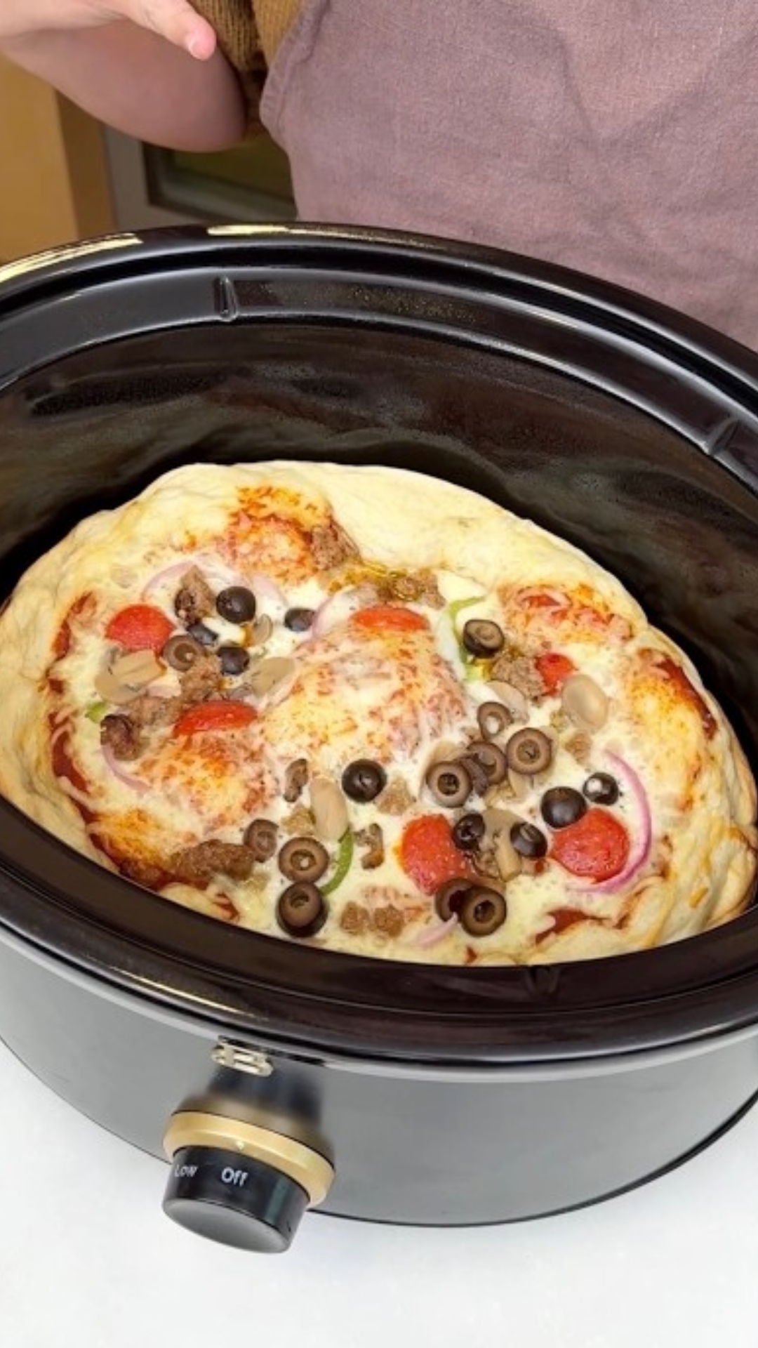 Chicago style deep dish pizza made in a crockpot