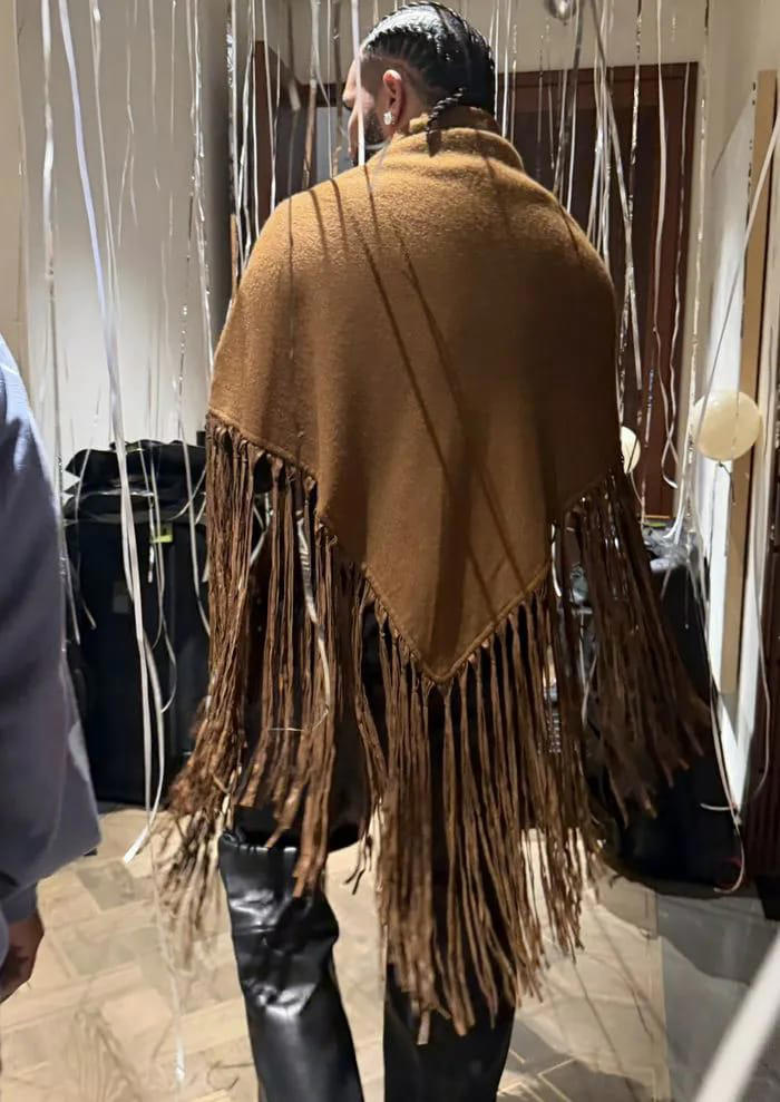 Drake goes viral after wearing a fringe shawl to his birthday party in NYC
