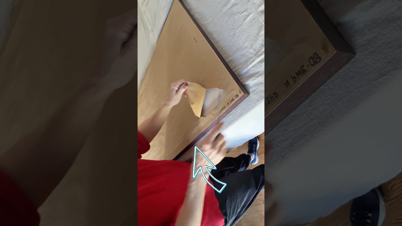 Rip the paper out of an old picture frame for this genius living room ...
